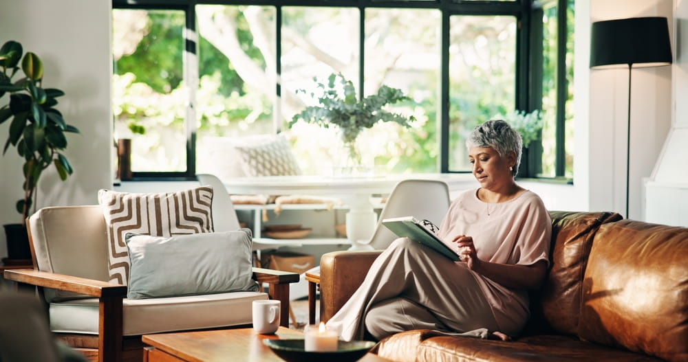 Browsing, website and woman with tablet, relax and subscription on app for entertainment and online.