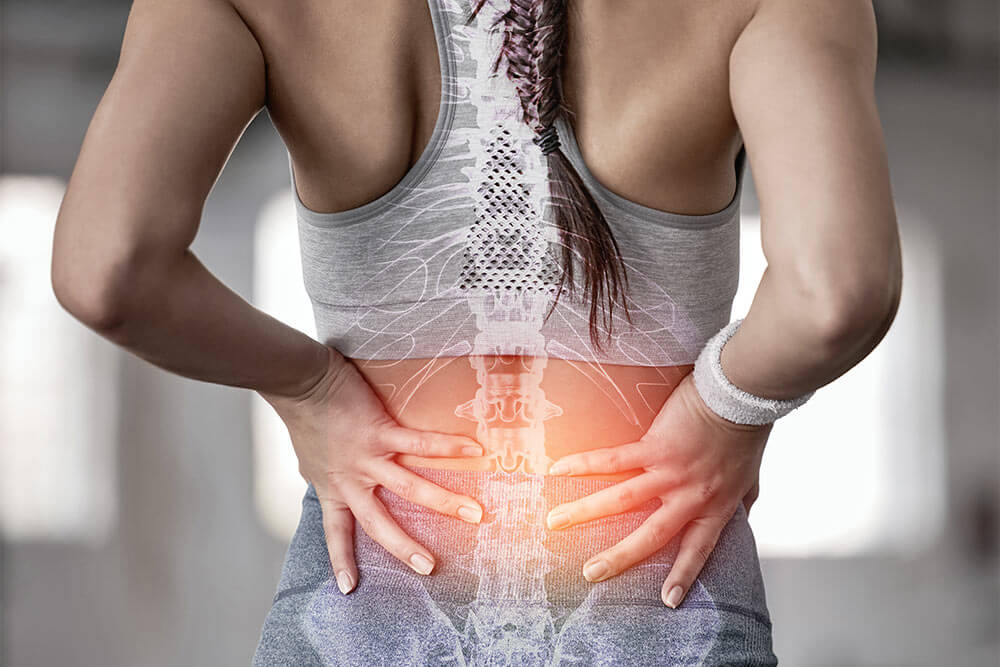 back of a woman with pain