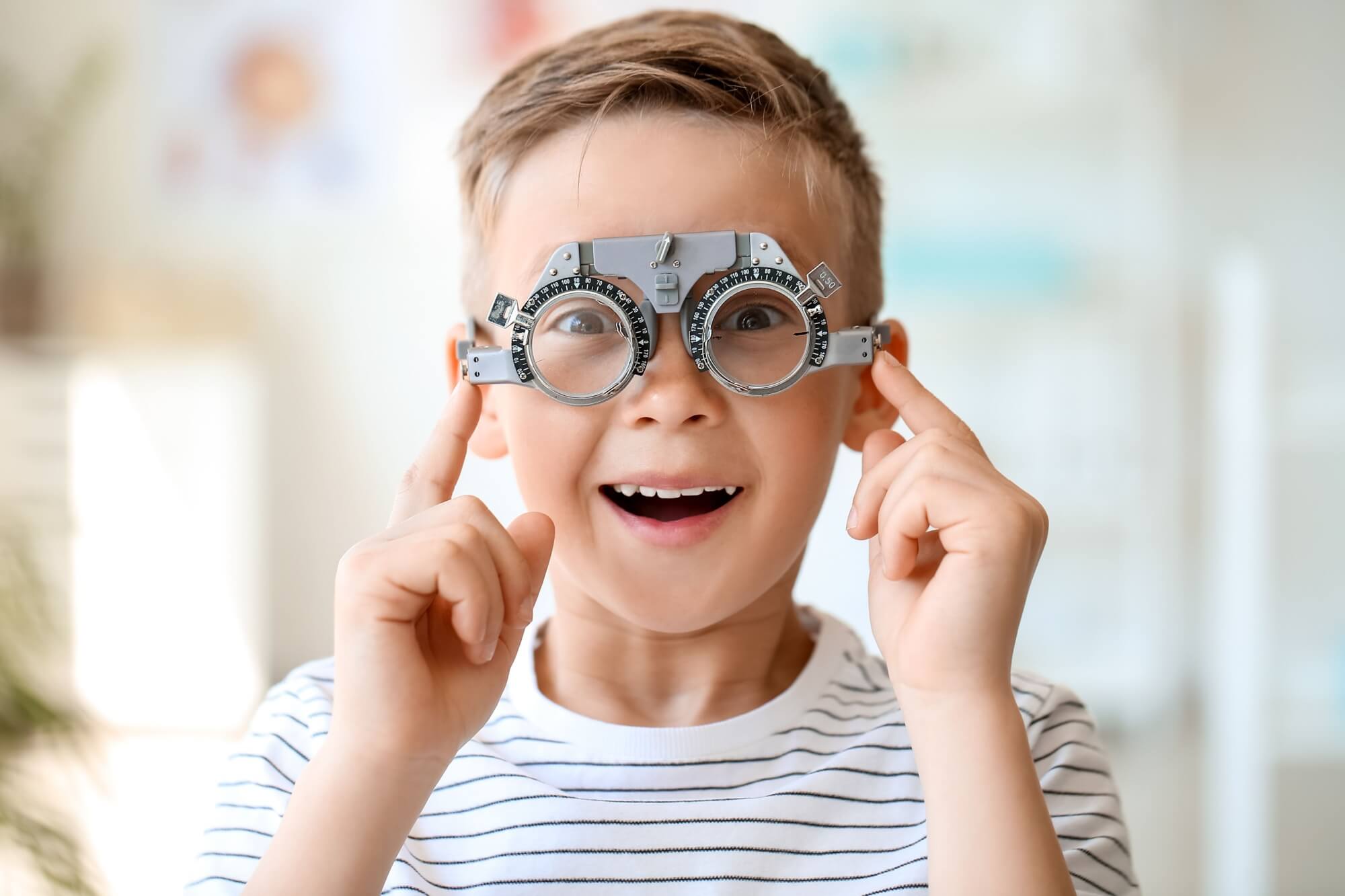 Trial frame. Glasses prescription for a child