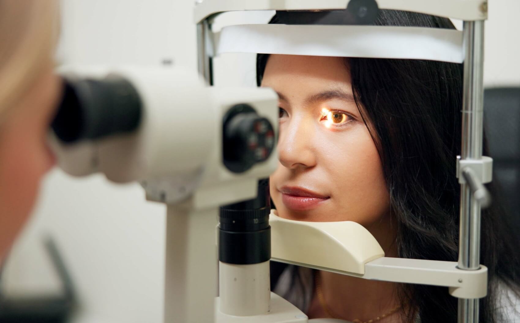 young woman, optometry and eye exam or test,