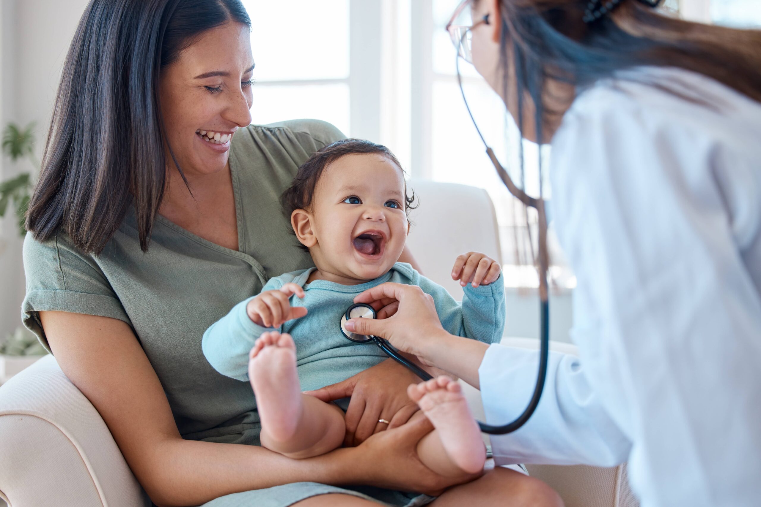 Mother, baby and stethoscope of pediatrician for healthcare consulting, check lungs and breathing for heartbeat.