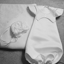 Caring for Coy Infant Burial Clothing
