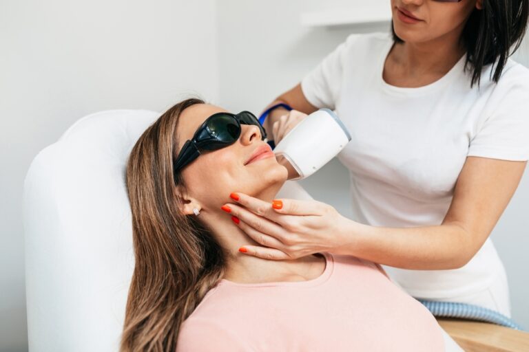 Beautiful woman on laser facial laser hair removal treatment