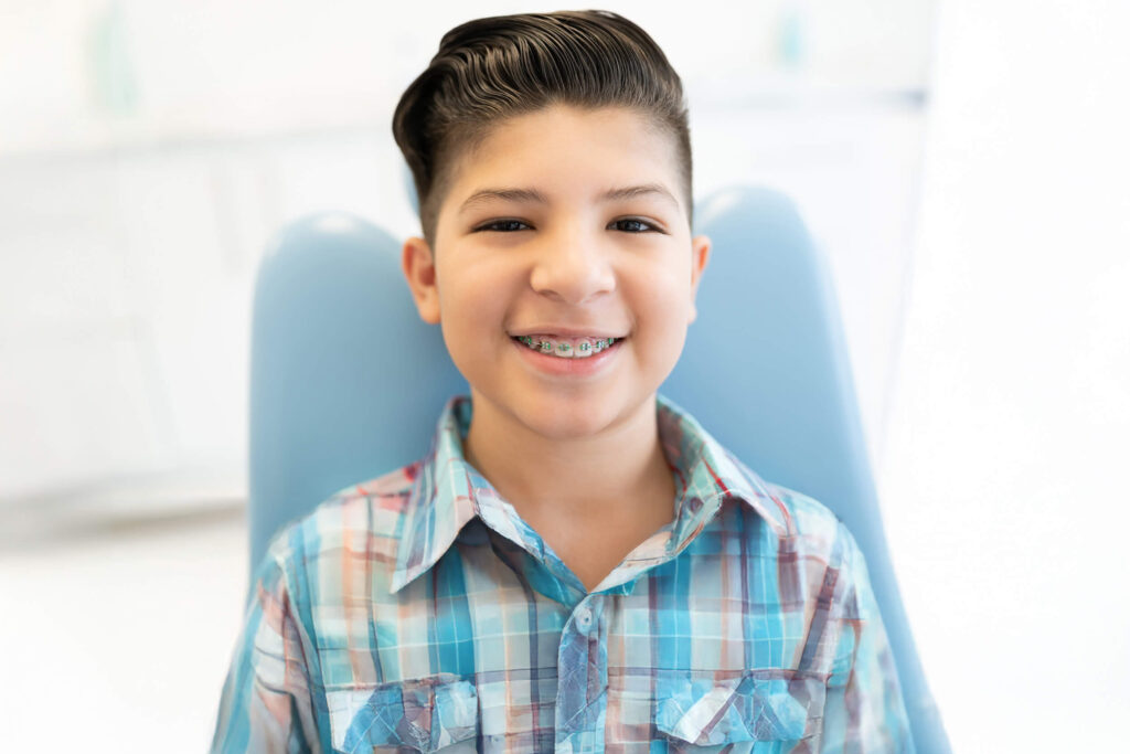 Dental braces on the teeth of a young boy