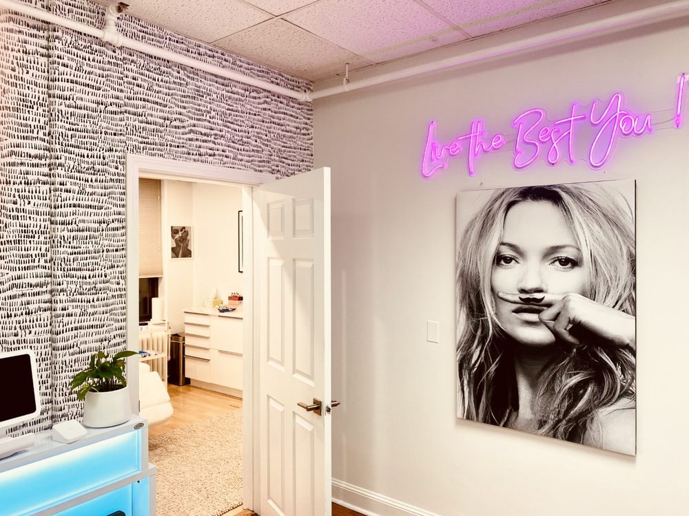 Clean, professional medical spa treatment room with neutral tones at Shah Wellness and Medspa in Newton