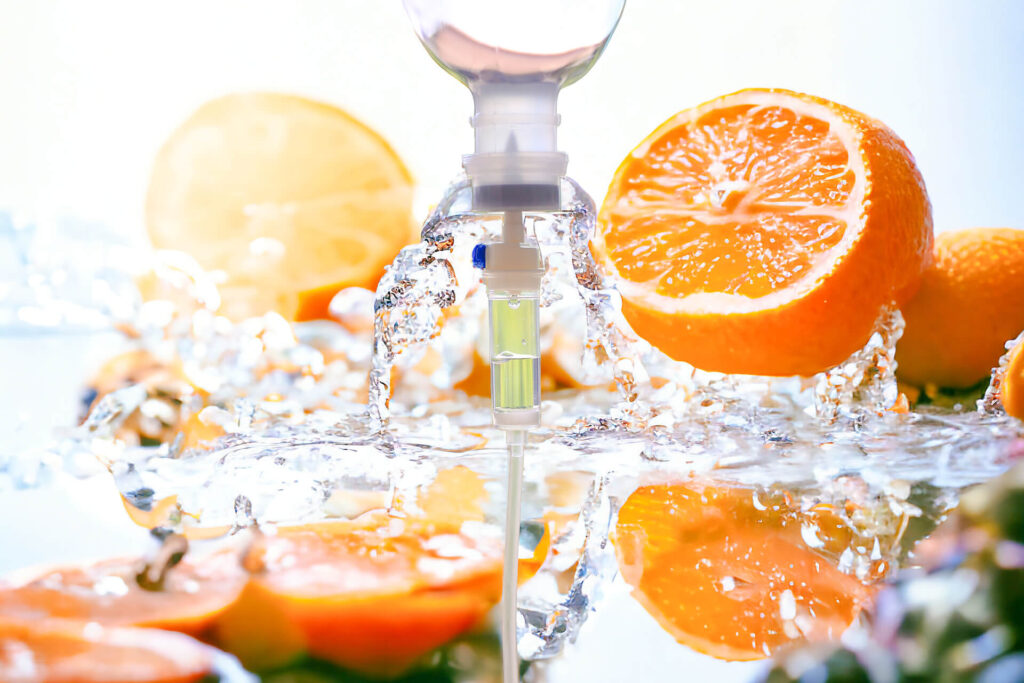 Vitamin c set iv drip and orange fruit