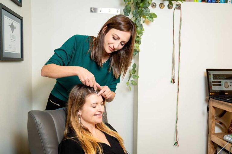 During treatment, Dr. Jessica Wendling is with the patient.