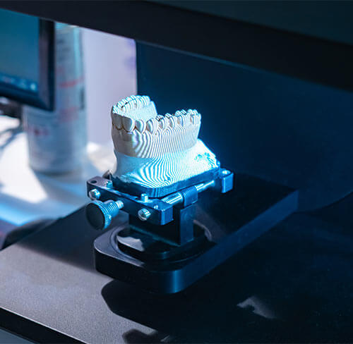 3D dental scanner being used to capture a digital impression of a dental model