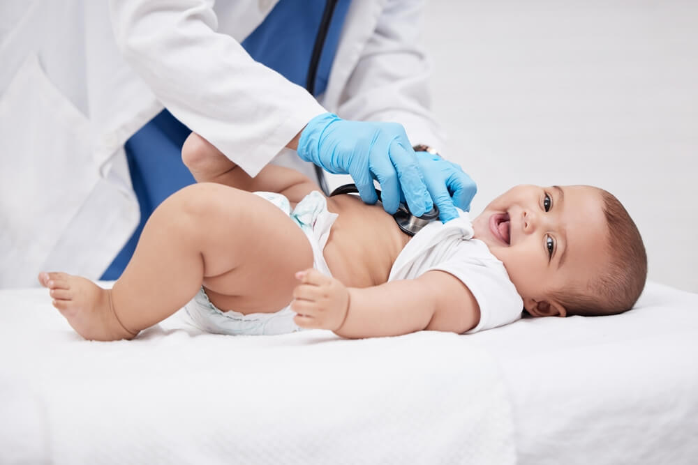 Baby, doctor and stethoscope for consult and heartbeat, checkup and lungs for healthcare in hospital