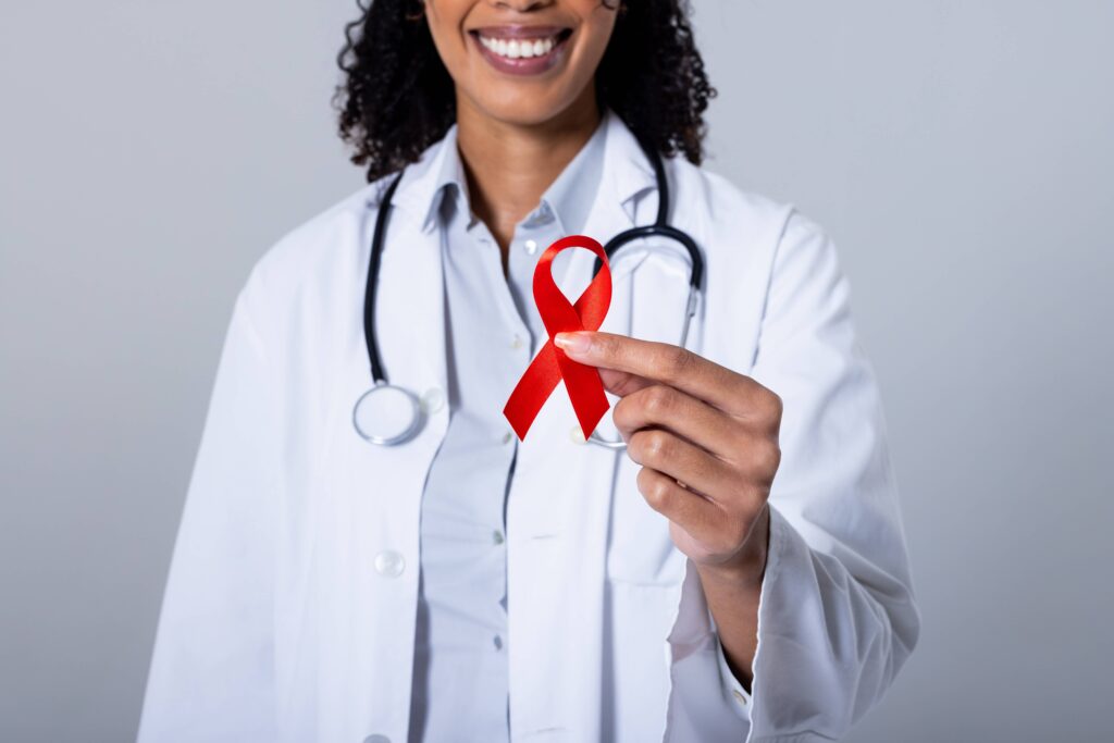 doctor with Red Ribbon for December World Aids Day