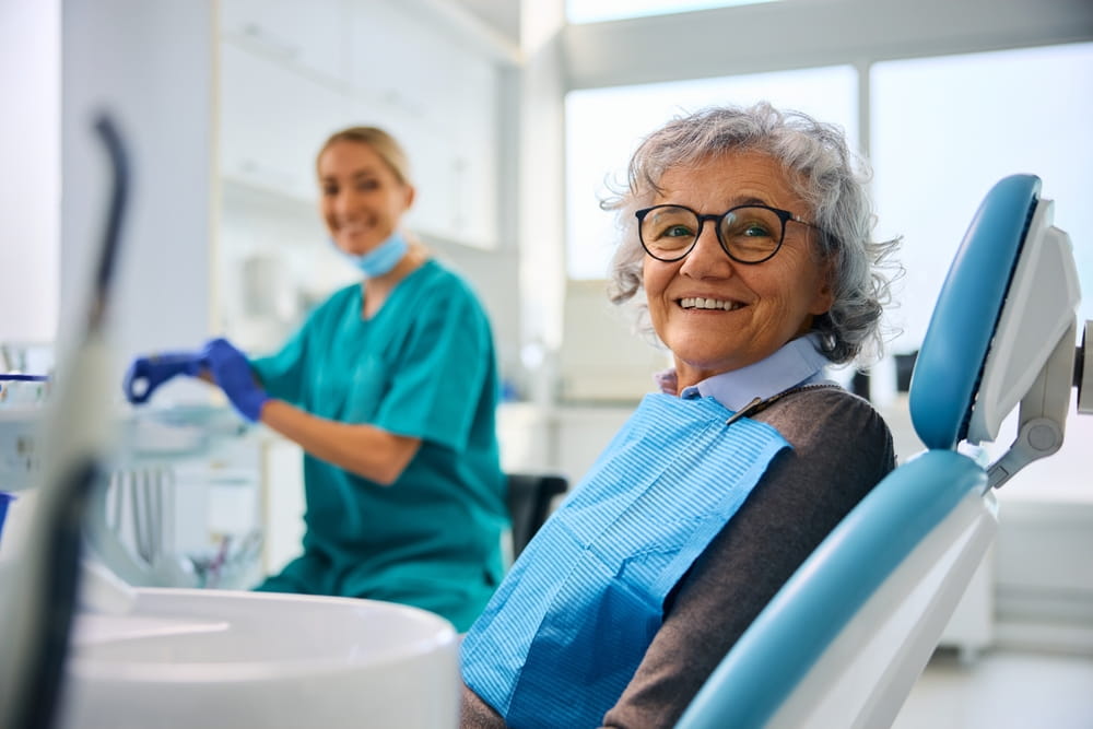 Happy senior woman during dental appointment at the dentist