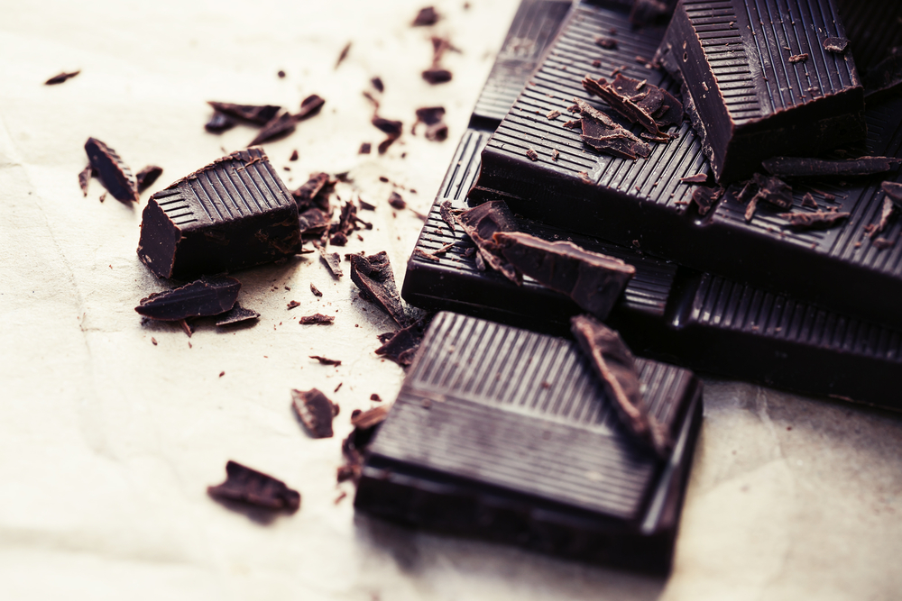 Chocolate pieces. Chopped dark chocolate closeup