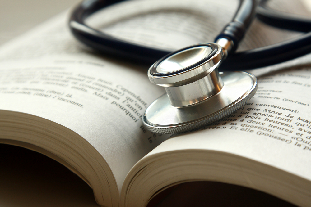 stethoscope on a pile of books