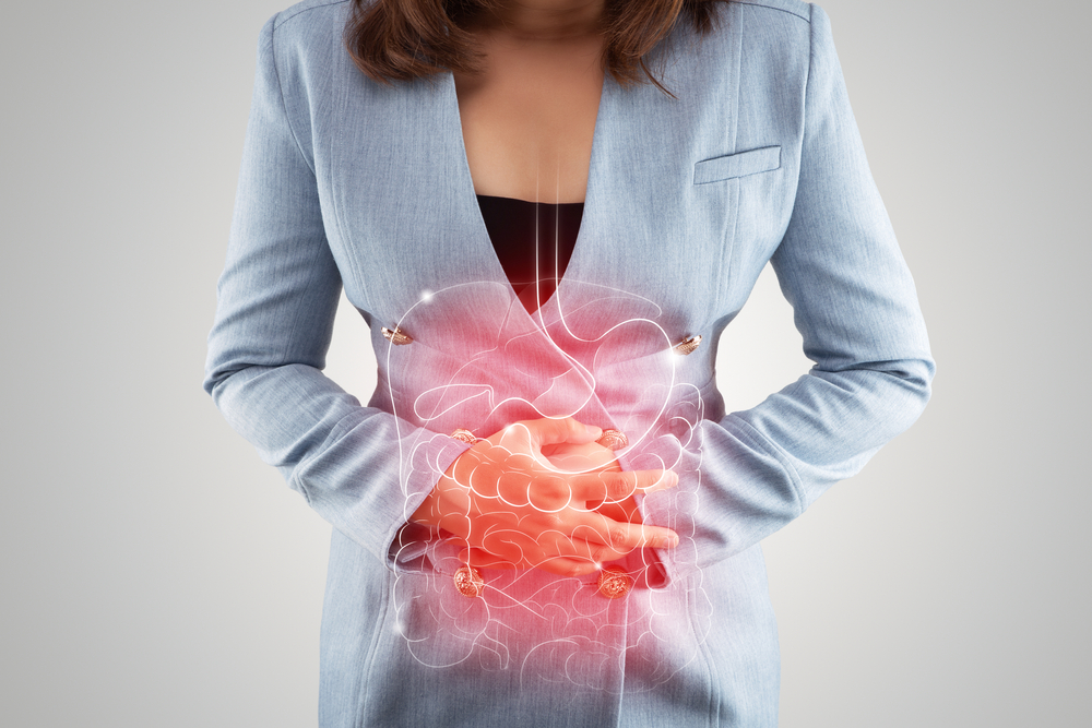 Business Woman touching stomach painful suffering from enteritis. internal organs of the human body. IBS