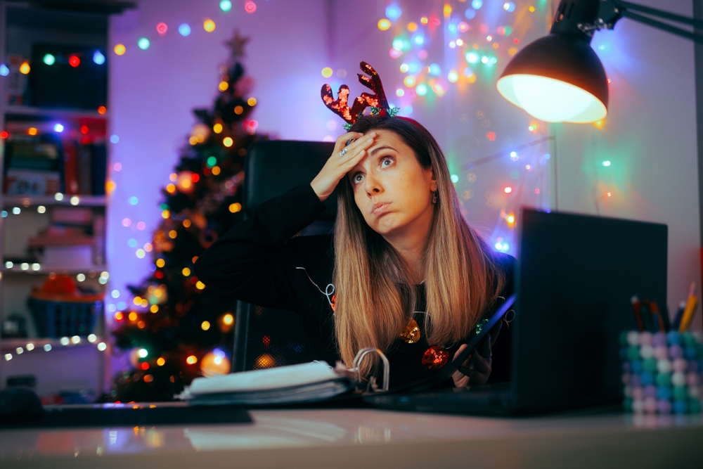 Stressed Woman Feeling Pressured to Work on Winter Holidays Office