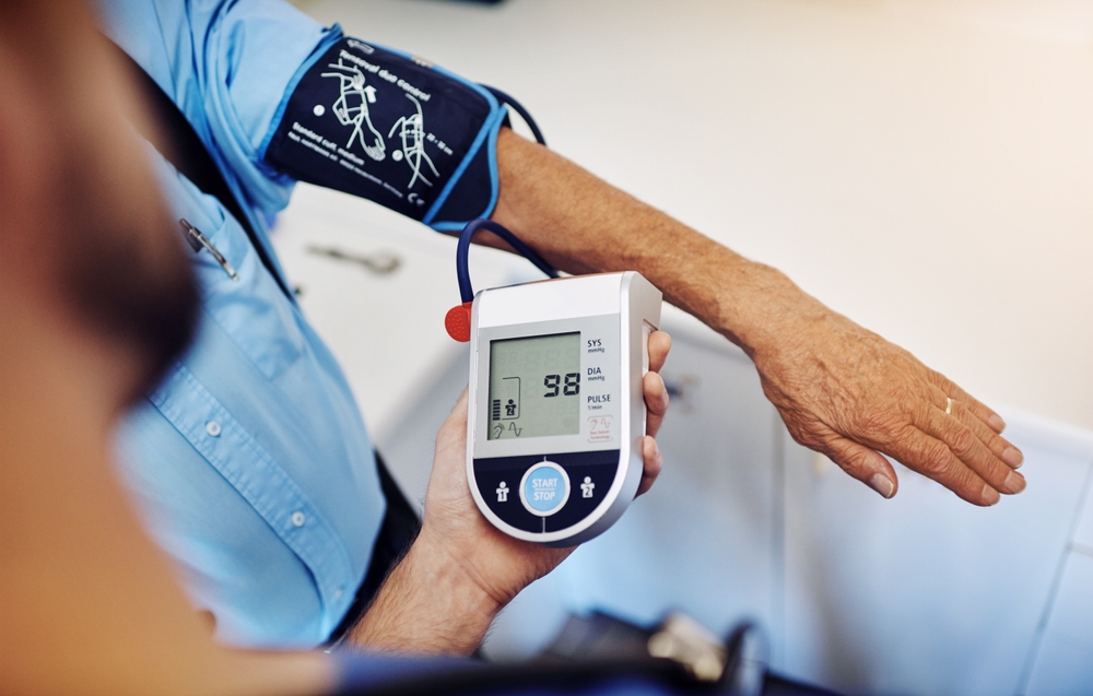 Blood pressure, hands and patient with nurse for checkup
