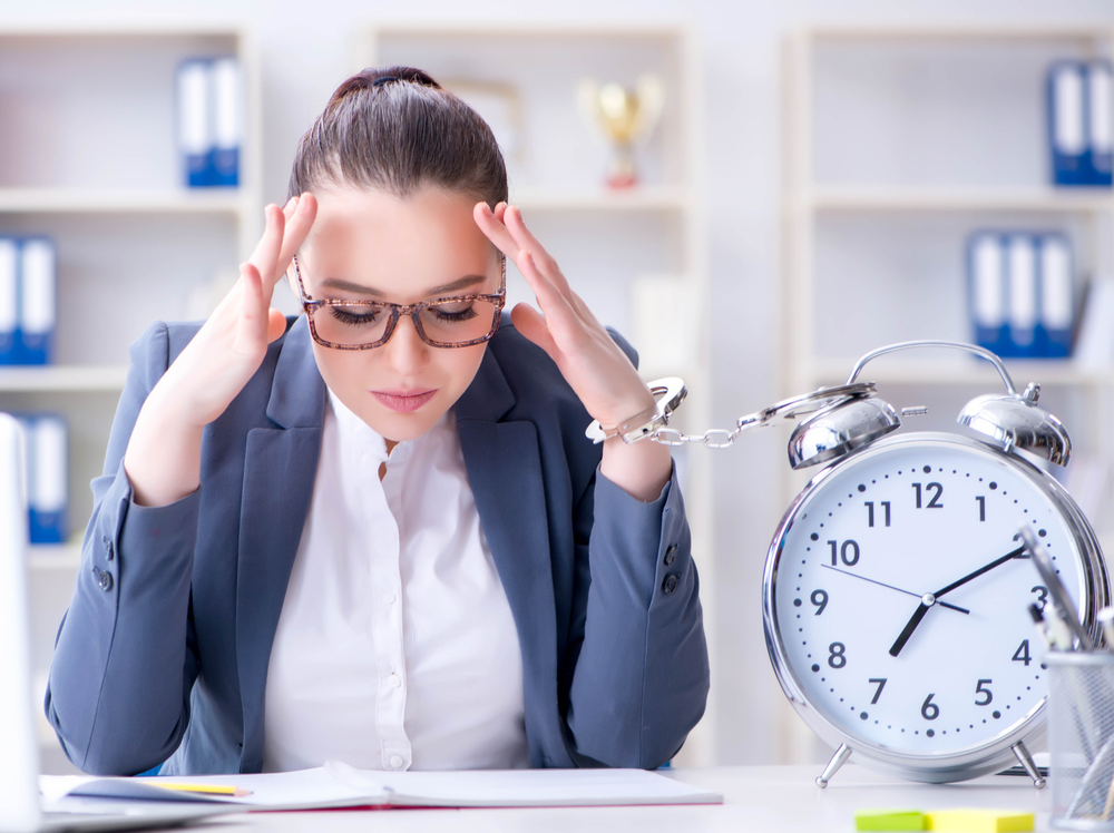 Businesswoman in time management concept