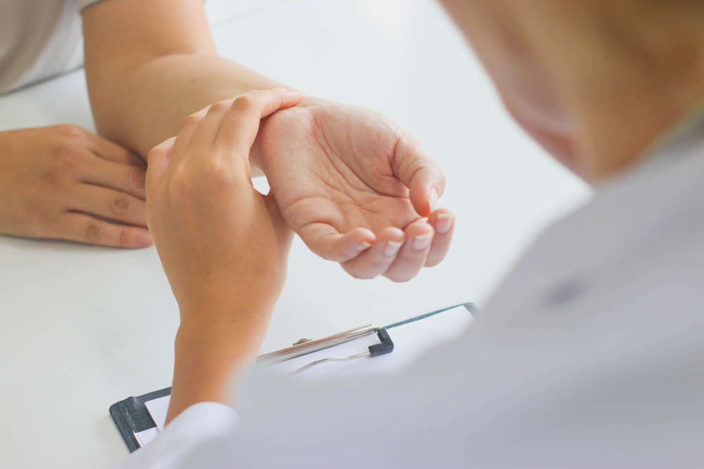 The Doctor Checks The Pulse of the patient