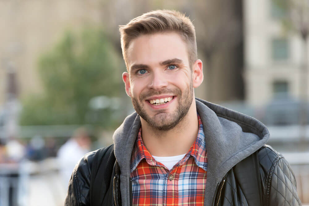 Young handsome man smiling