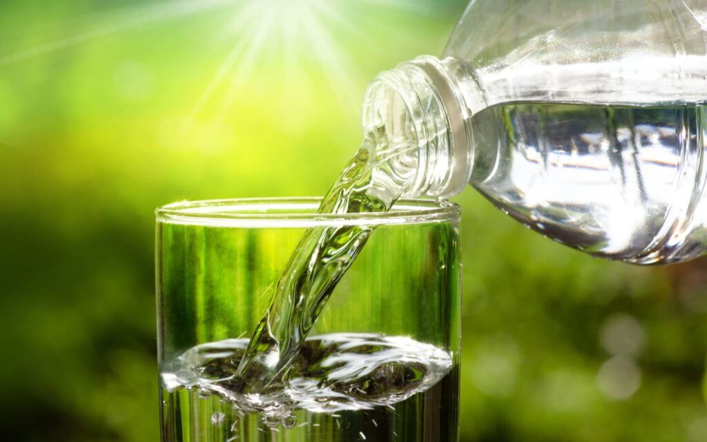 Glass being filled with pure water