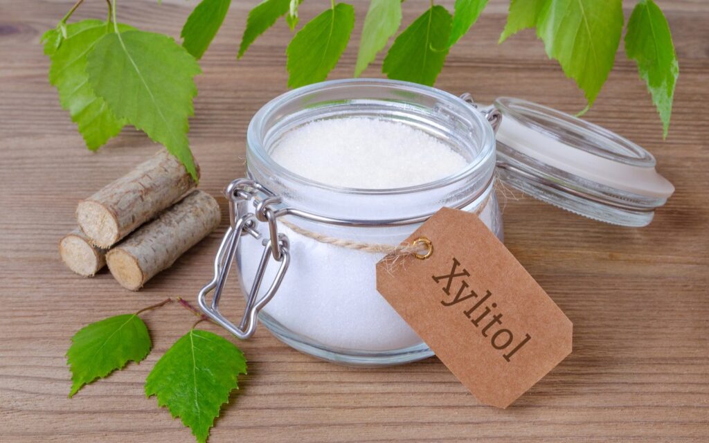 Container of xylitol crystals