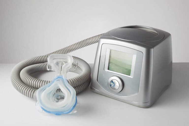 CPAP machine with mask and hose, for people with sleep apnea, respiratory, or breathing disorder