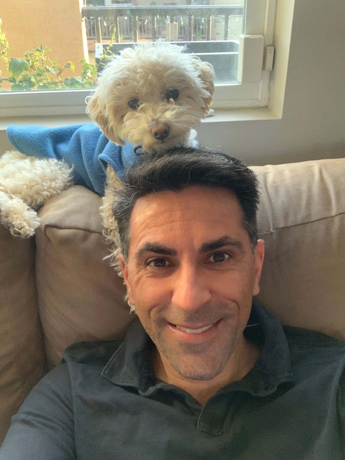 Dr. Mitesh with his poodle
