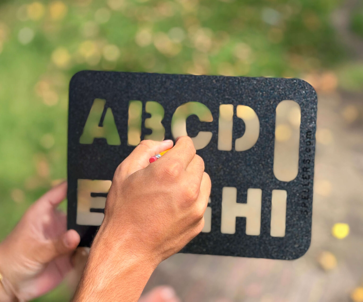 a person using a letterboard