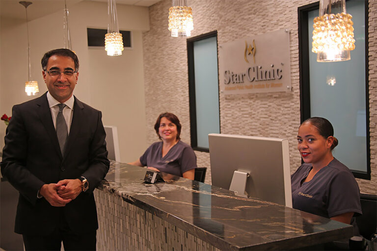 Dr. Azadi and Staff at Reception desk