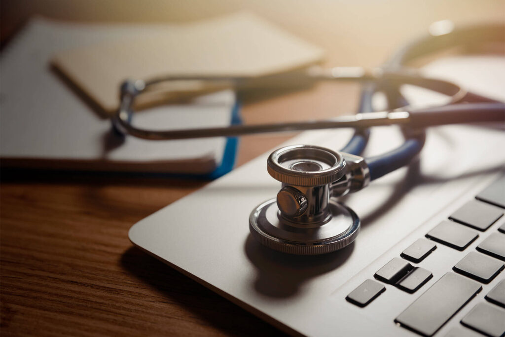 Stethoscope on laptop keyboard