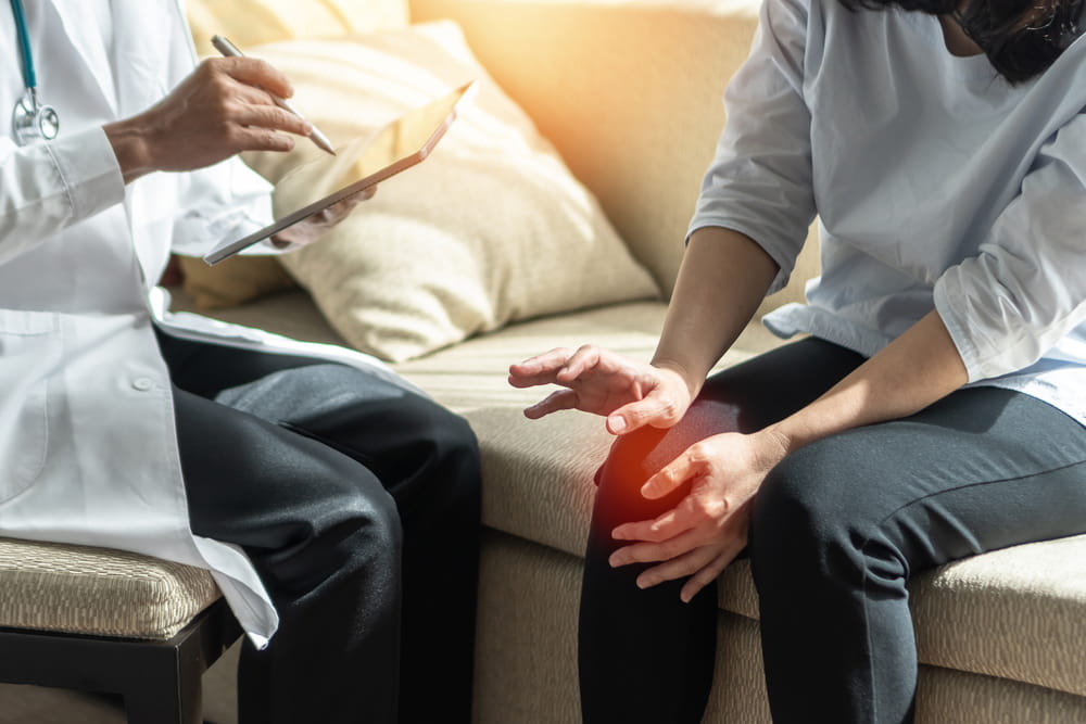 Arthritis hand and knee pain, joint injury or Osteoporosis bone disease patient with orthopedic surgical doctor consulting