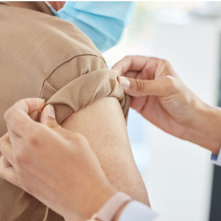 Arm, hands and doctor with patient for vaccine