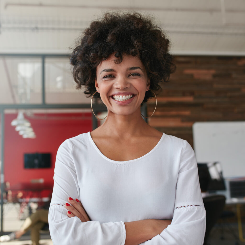 Happy young Woman with curl hair