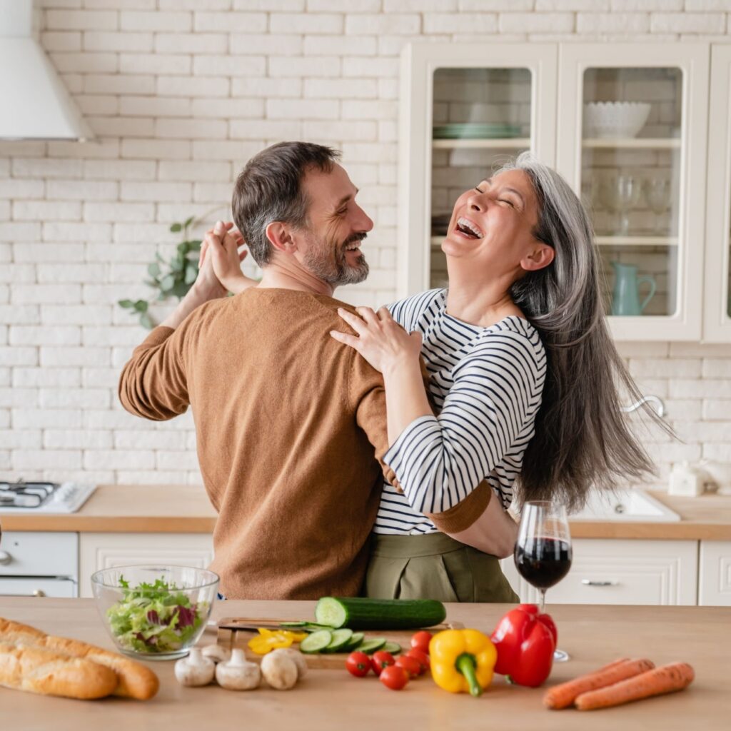 Happy cheerful middle-aged mature couple