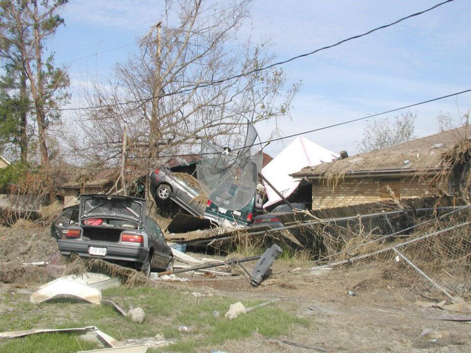 cars and houses damaged by hurricane katrina