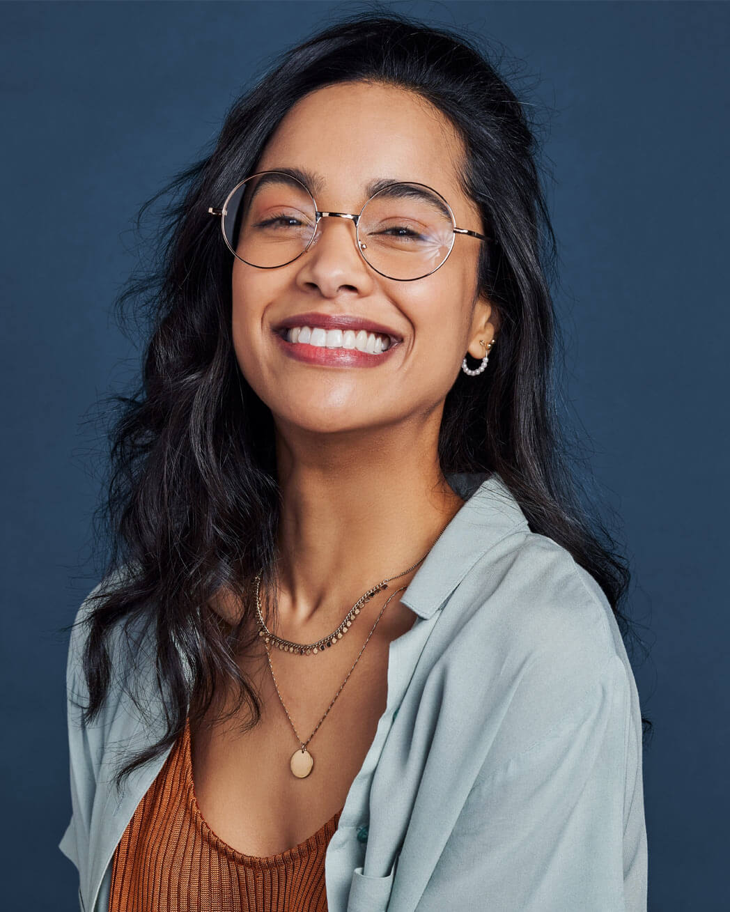 woman with eyeglasses smiling