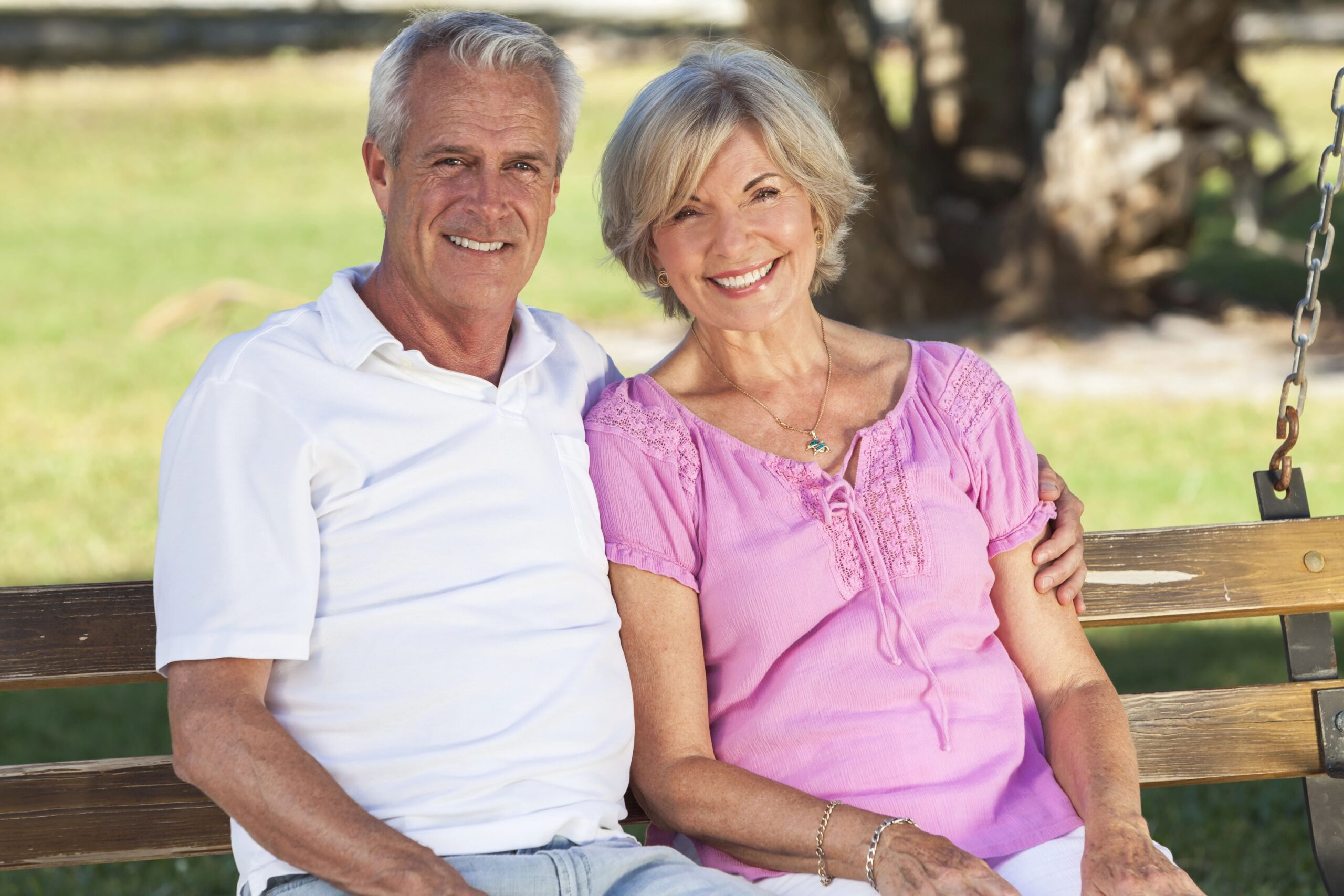 Happy aged couple smiling