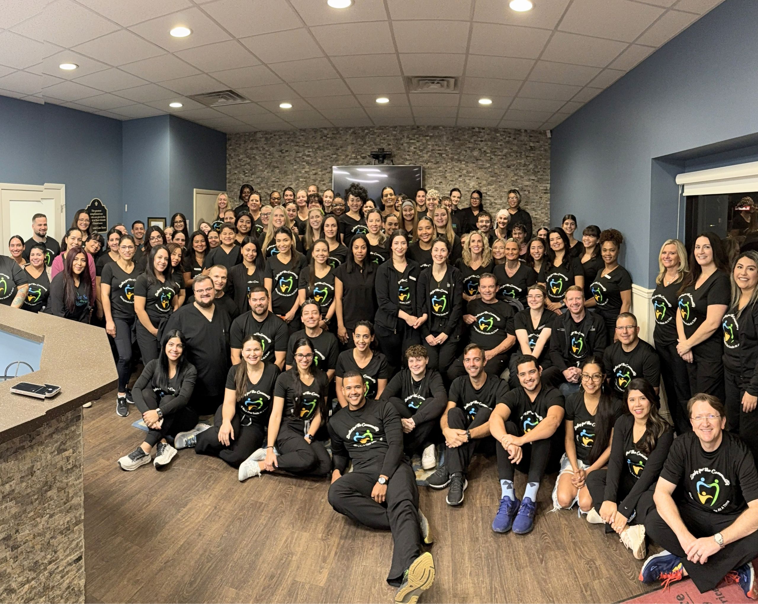 A large group of dental professionals