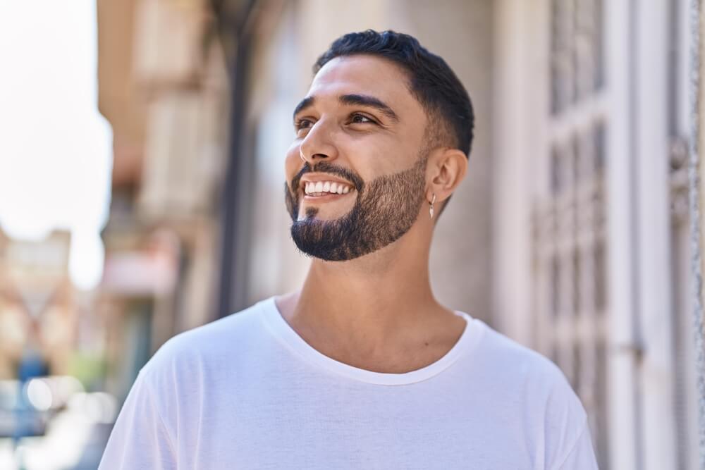 Young man smiling confident