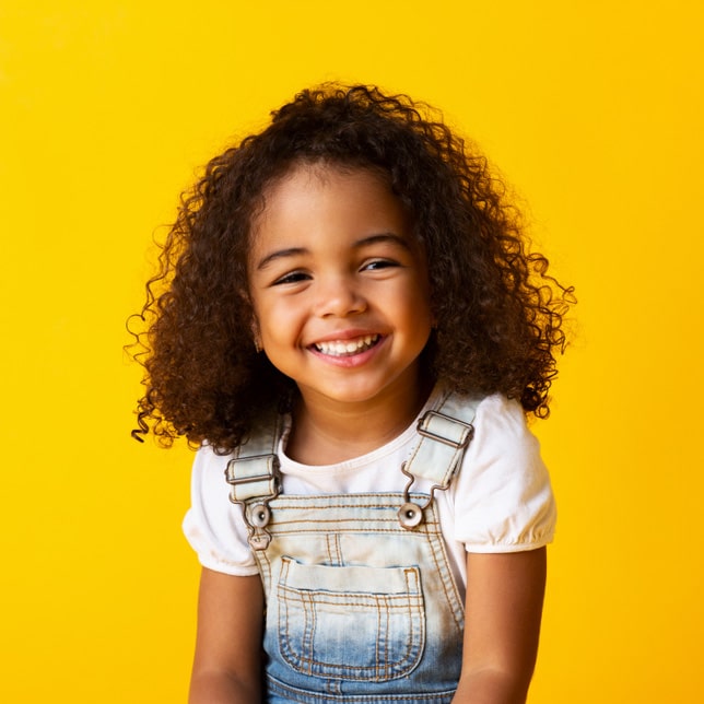 Happy child girl smiling