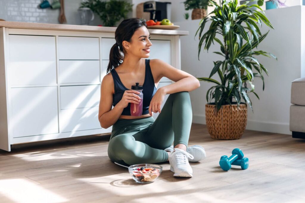 woman drinking healthy protein shake