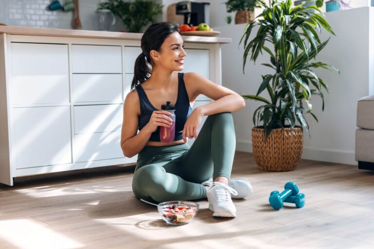 woman drinking healthy protein shake
