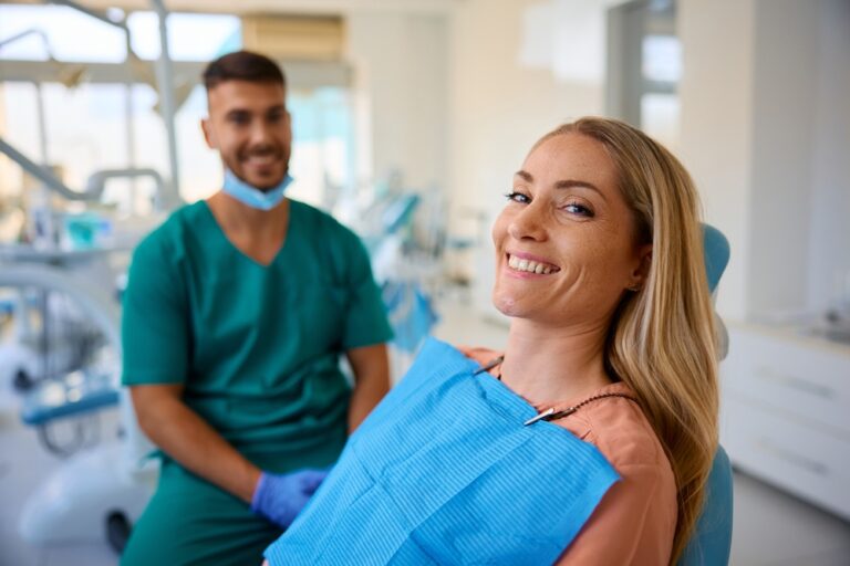 Happy Woman Having Appointment At Dentist