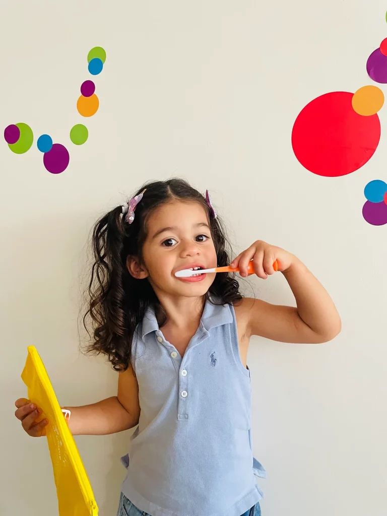 Office tour photos showing young girl brushing teeth