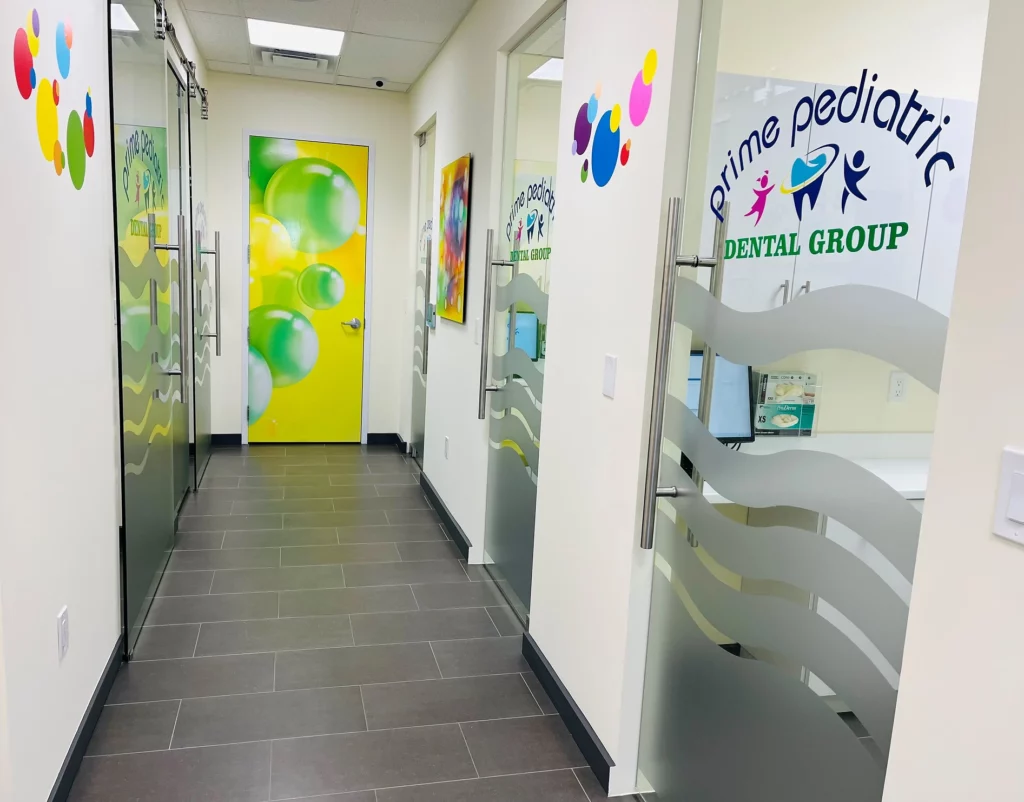 Office tour photos showing Prime Pediatric Dental Group decal logo and hallway