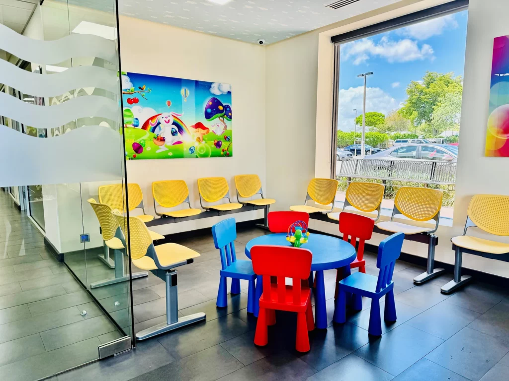 Office tour photos showing waiting play area