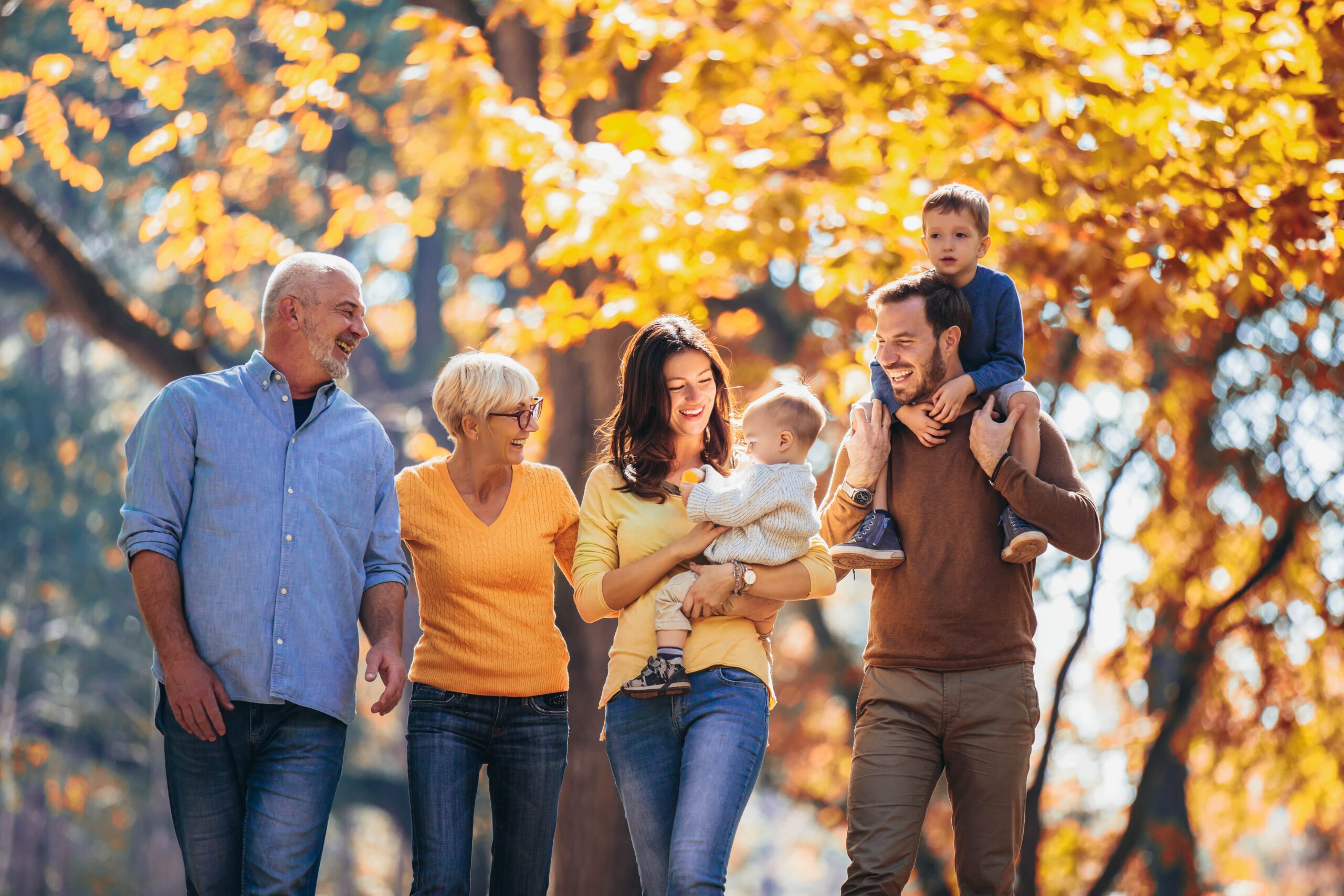 Multi generation family in autumn park