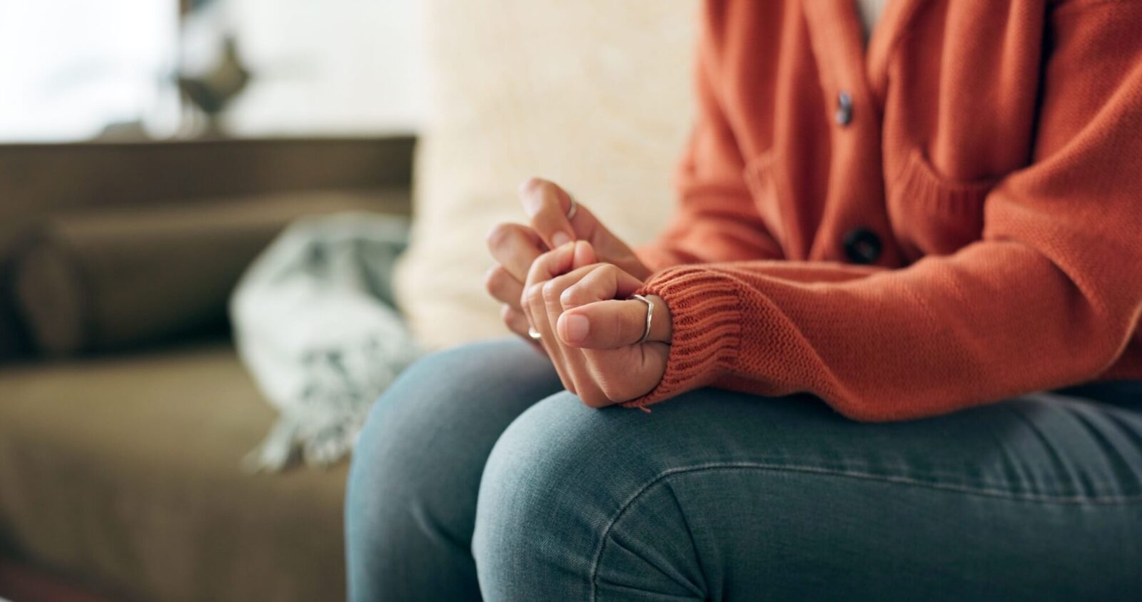 woman on sofa for mental health, depression or counselling session