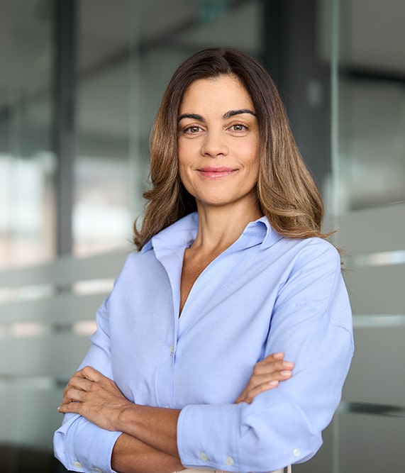 Confident woman with arms crossed