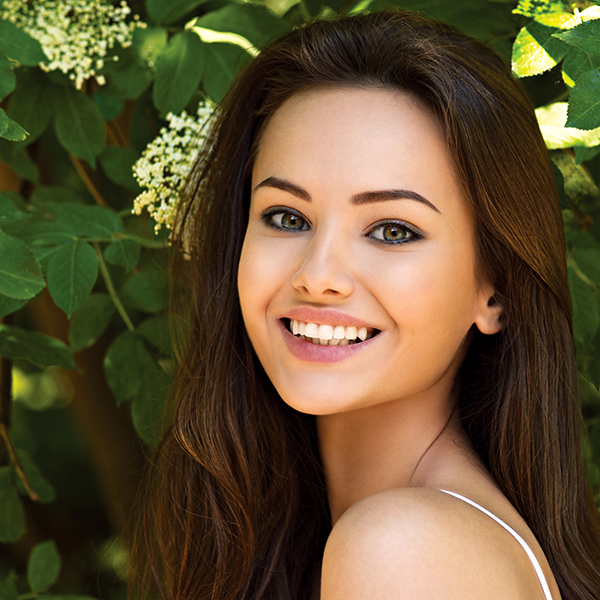 young beautiful smiling woman outdoors